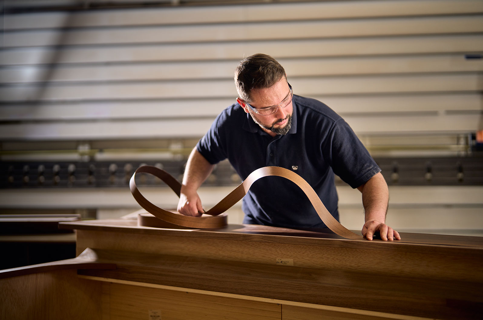 This studio shot is lit to convey the aged and crafted character of the cheese.