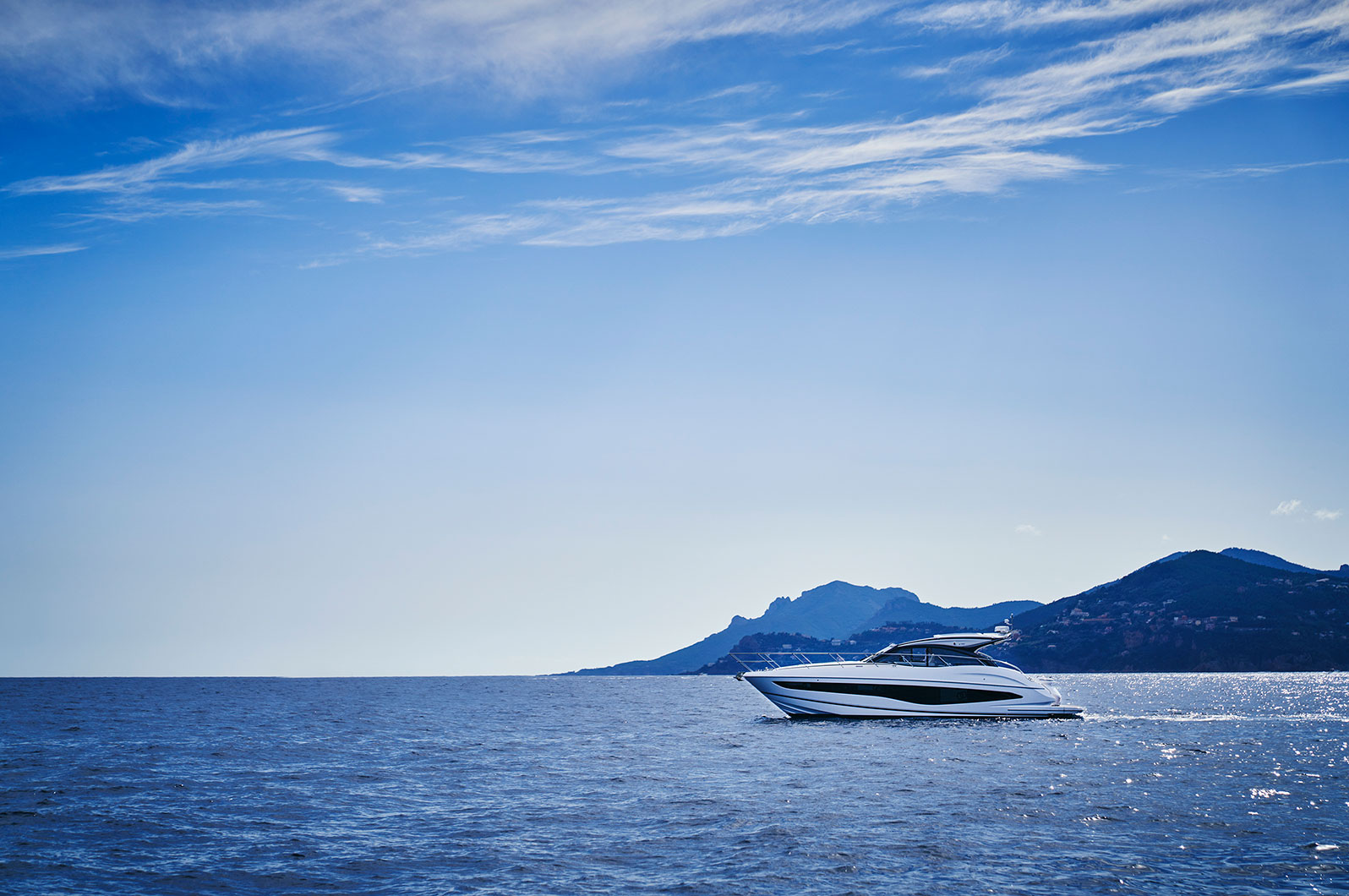 Studio shots of boxes which were lit to be retouched into backgrounds sourced from an image library.